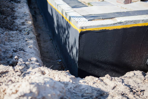 Professional Waterproofing technician working in Glandorf, OH